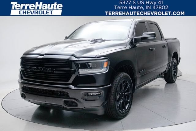 2023 RAM 1500 Laramie Crew Cab 4x4 5'7" Box in Black — front three-quarter view
