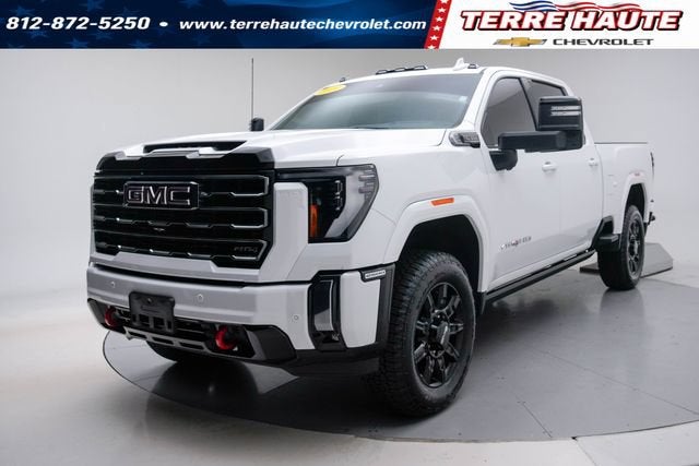 2024 GMC Sierra 2500 HD AT4 in Summit White — front three-quarter view