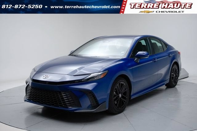 2025 Toyota Camry LE in Blue — front three-quarter view
