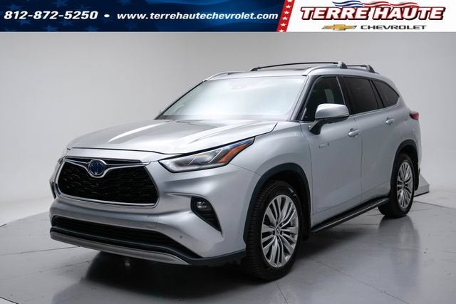 2021 Toyota Highlander Hybrid Platinum in Silver — front three-quarter view