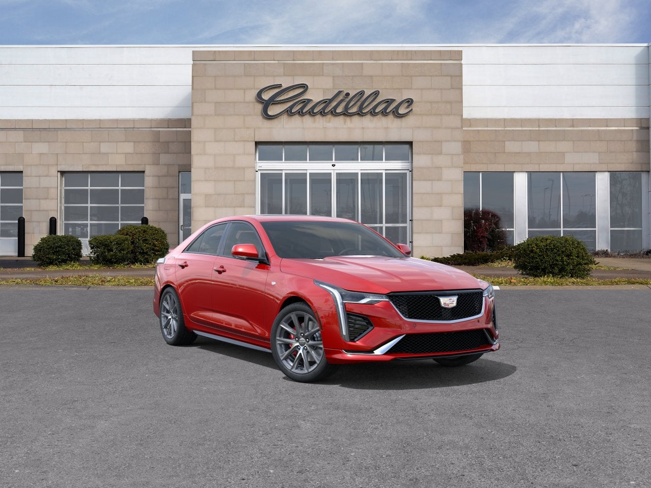2026 Cadillac CT4 Sport in Radiant Red Tintcoat — front three-quarter view