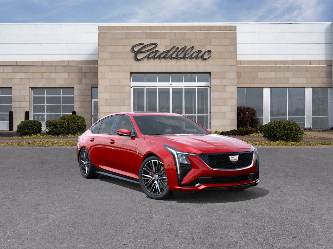 2026 Cadillac CT5 Sport in Radiant Red Tintcoat — front three-quarter view