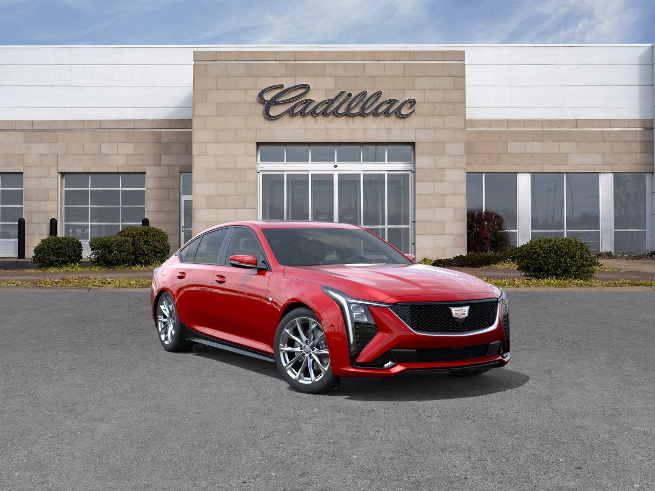 2026 Cadillac CT5 Sport in Radiant Red Tintcoat — front three-quarter view