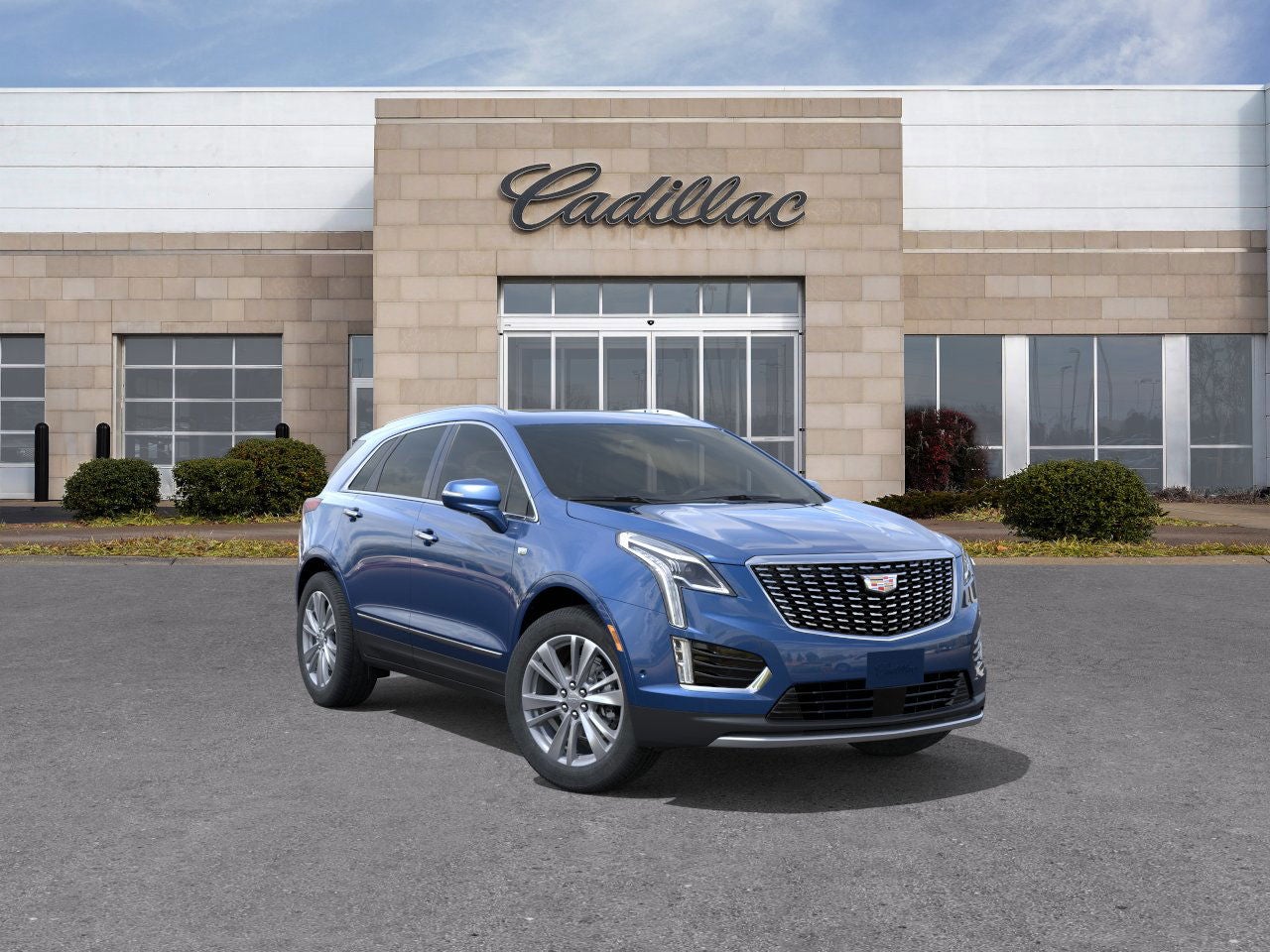 2026 Cadillac XT5 Premium Luxury in Opulent Blue Metallic — front three-quarter view