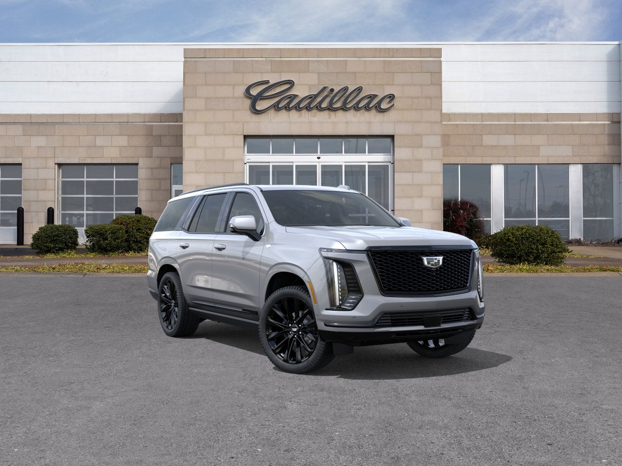 2026 Cadillac Escalade Platinum Sport in Argent Silver Metallic — front three-quarter view