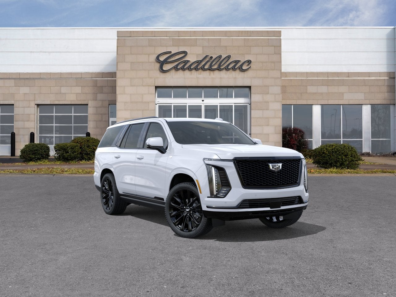 2026 Cadillac Escalade Platinum Sport in Vibrant White Tricoat — front three-quarter view
