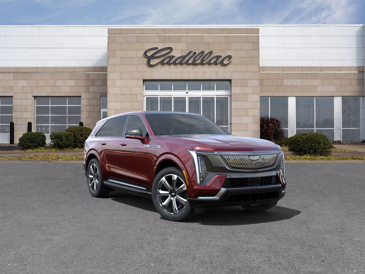 2025 Cadillac ESCALADE IQ Luxury 1 in Black Cherry Tintcoat — front three-quarter view