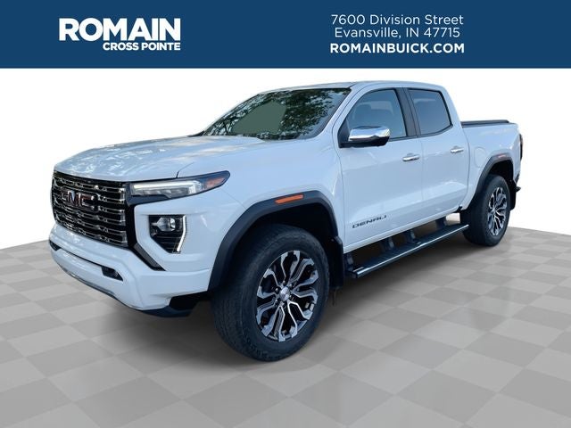 2023 GMC Canyon Denali in Summit White — front three-quarter view