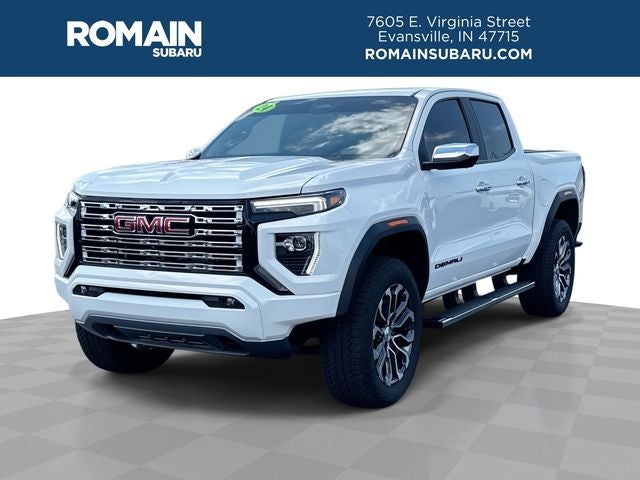 2024 GMC Canyon Denali in Summit White — front three-quarter view