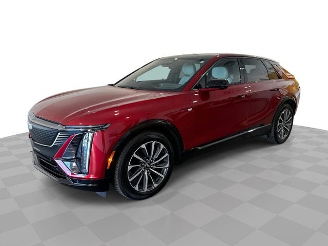 2024 Cadillac LYRIQ Sport in Radiant Red Tintcoat — front three-quarter view
