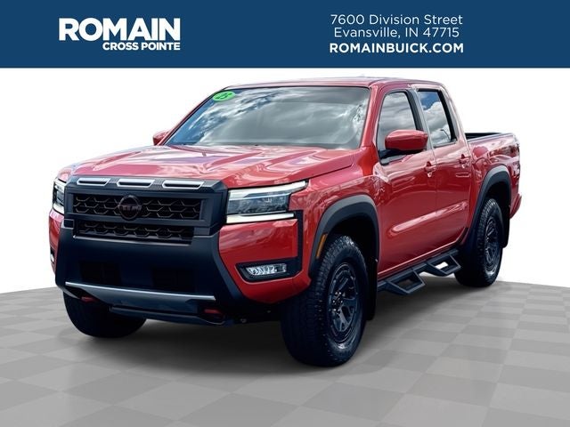 2025 Nissan Frontier PRO-4X in Afterburn Orange — front three-quarter view