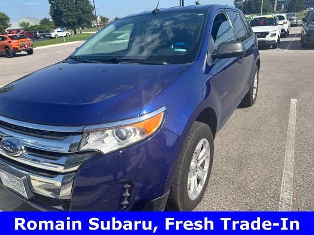 2013 Ford Edge SE in Blue — front three-quarter view