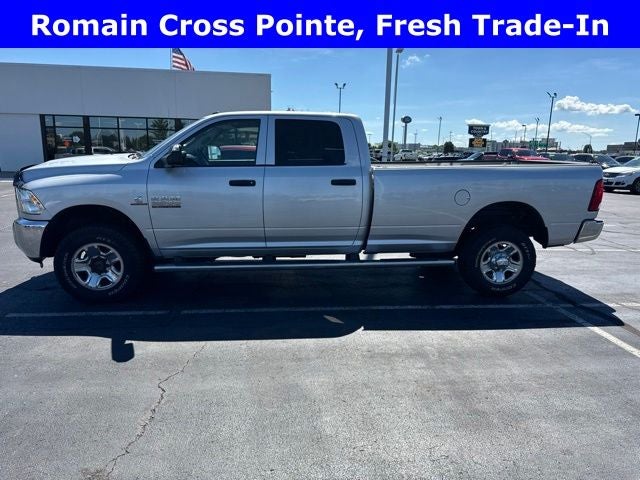2016 RAM 2500 Tradesman in Bright Silver Metallic Clearcoat — front three-quarter view