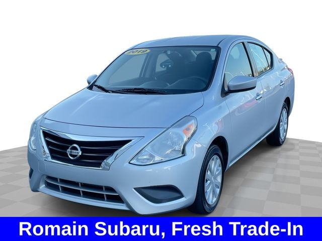 2019 Nissan Versa 1.6 SV in Brilliant Silver Metallic — front three-quarter view