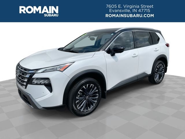 2025 Nissan Rogue SL in Everest White Pearl/Super Black — front three-quarter view
