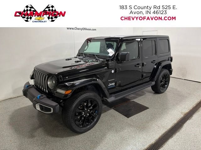 2023 Jeep Wrangler 4xe Sahara in Black — front three-quarter view
