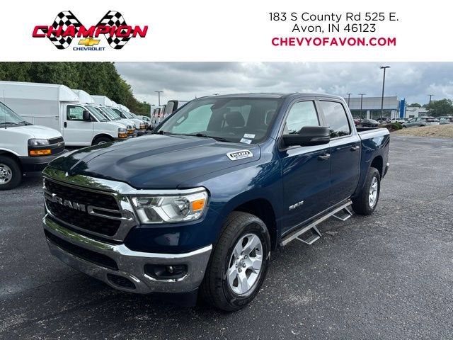2023 RAM 1500 Big Horn in Blue — front three-quarter view