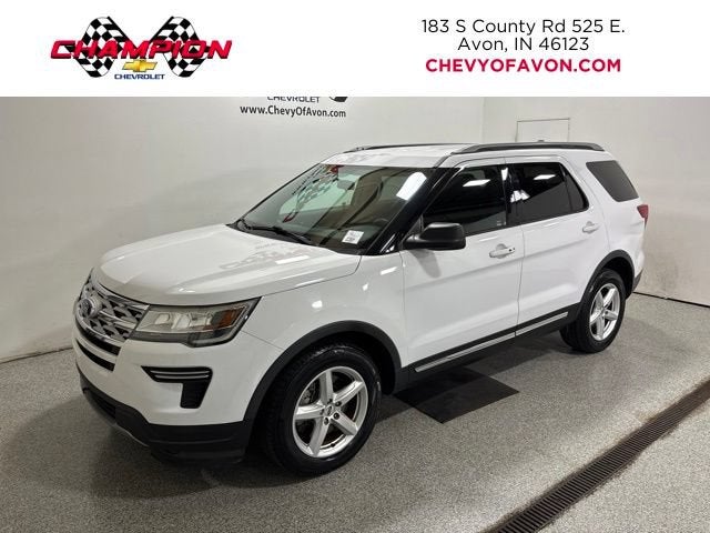 2019 Ford Explorer XLT in White — front three-quarter view