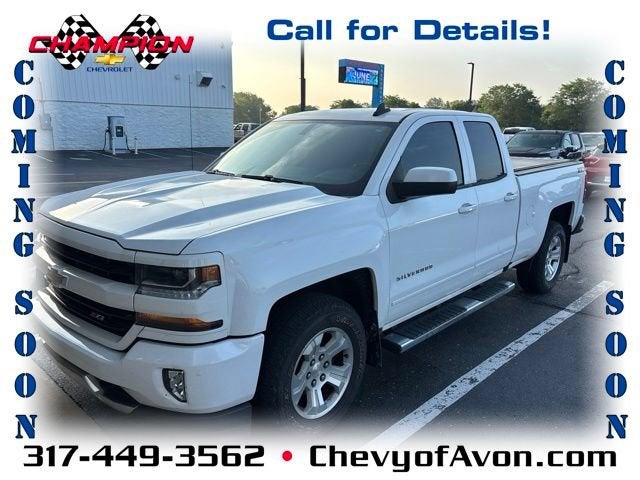 2018 Chevrolet Silverado 1500 LT in Summit White — front three-quarter view