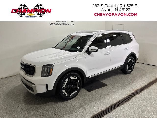 2024 Kia Telluride EX in White — front three-quarter view